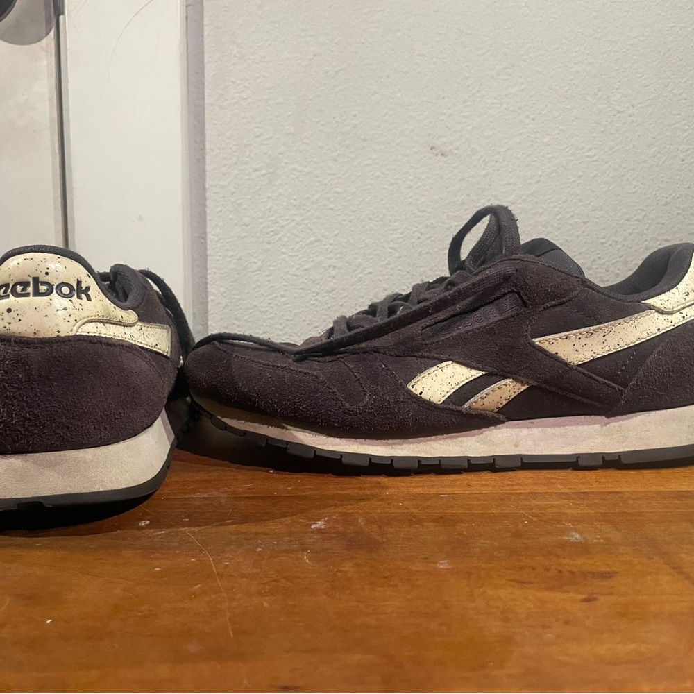 Reebok Black and Gold Classic Sneakers with Retro Design